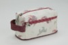 2011 Printed canvas make up bag with contrast handle on side