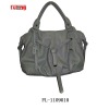 2011 decorative strap handbag at front