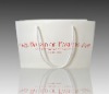 Horizontal white paper shopping bag with cotton handle