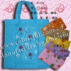 Nonwoven foldable shopping bag